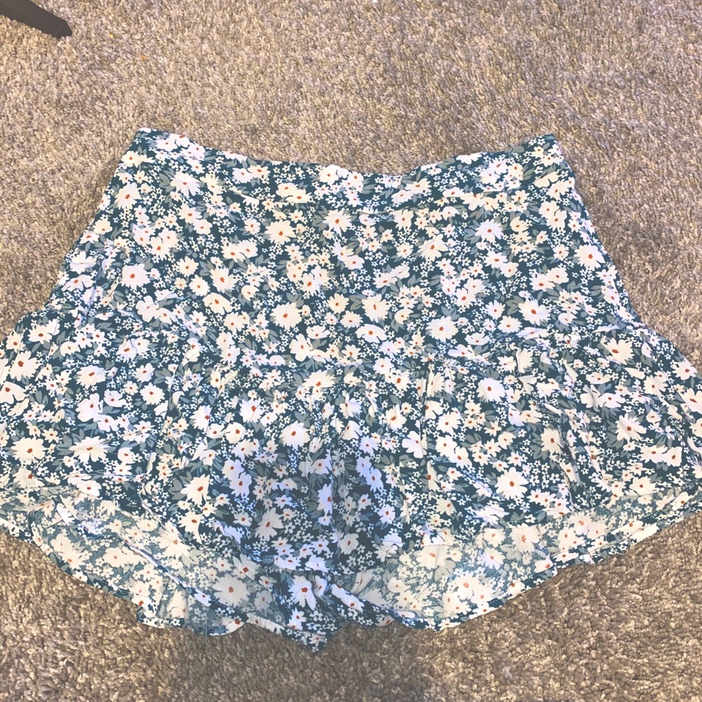 Shorts with skirts overlay